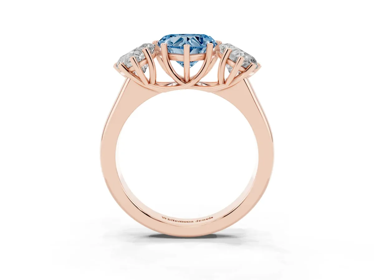 Fancy Blue Heart Cut Three-Stone Diamond Ring with Prong Setting on a Classic Band Rose gold