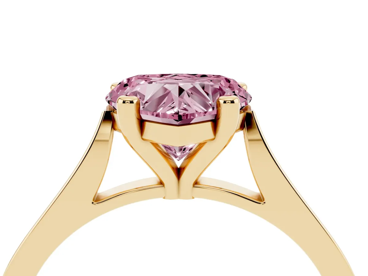 Fancy Pink Heart Cut Solitaire Diamond Ring with Four-Prong Setting and Tapered Band Yellow gold