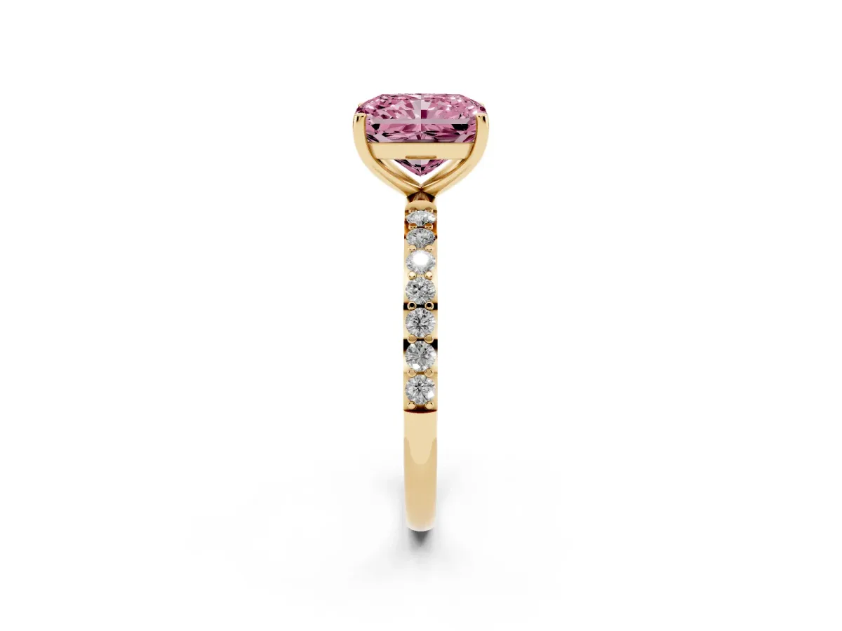 Fancy Pink Radiant Cut Diamond Solitaire Ring with Round Pavé Shoulders and Prong Setting Yellow gold