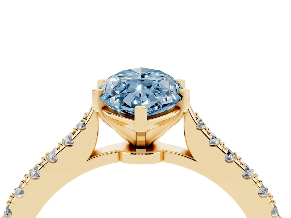Fancy Blue Marquise Cut Cut Solitaire Diamond Engagement Ring with Pave Band and Four-Prong Setting Yellow gold