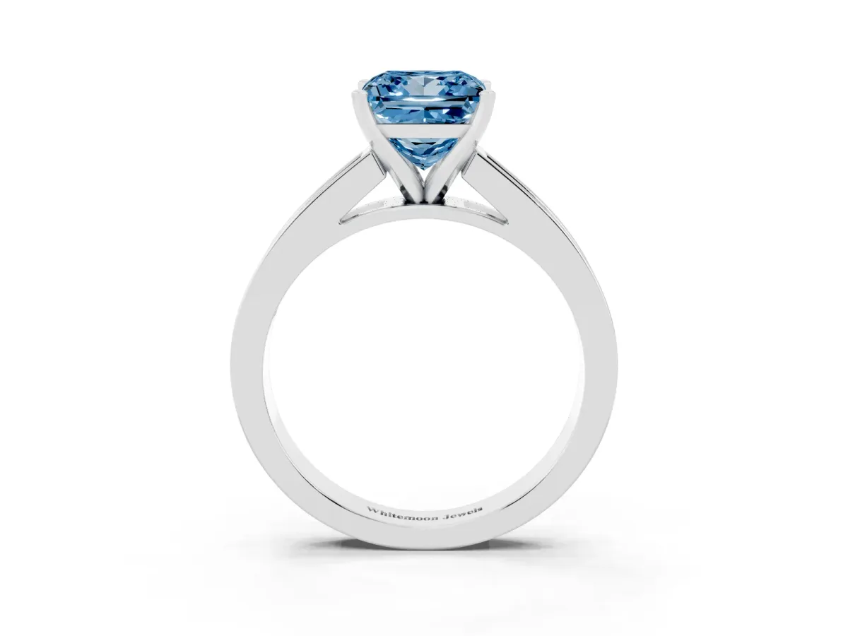 Fancy Blue Princess Cut Solitaire Diamond Ring with Channel-Set Band and Four-Prong Setting Platinum