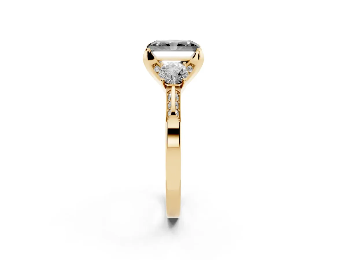 Fancy Black Radiant Cut Brilliant Three-Stone Diamond Ring with Pavé Band and Four-Prong Setting Yellow gold
