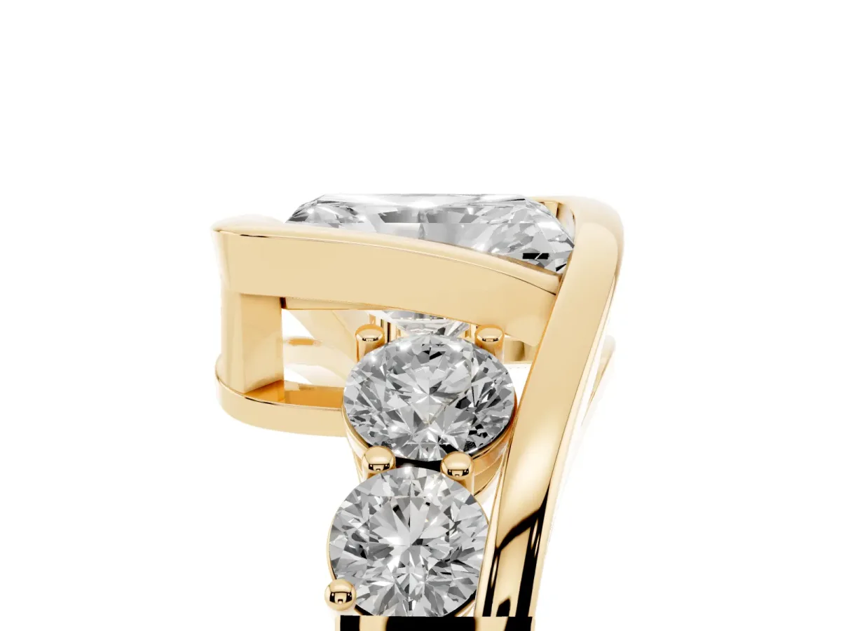 Bezel Set Radiant Cut Diamond Bypass Ring with Round Accents Yellow gold