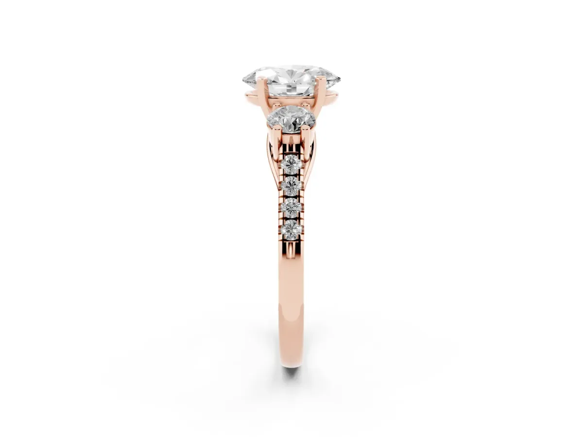 Three-Stone Oval Cut Diamond Pavé Band with Four-Prong Setting Rose gold