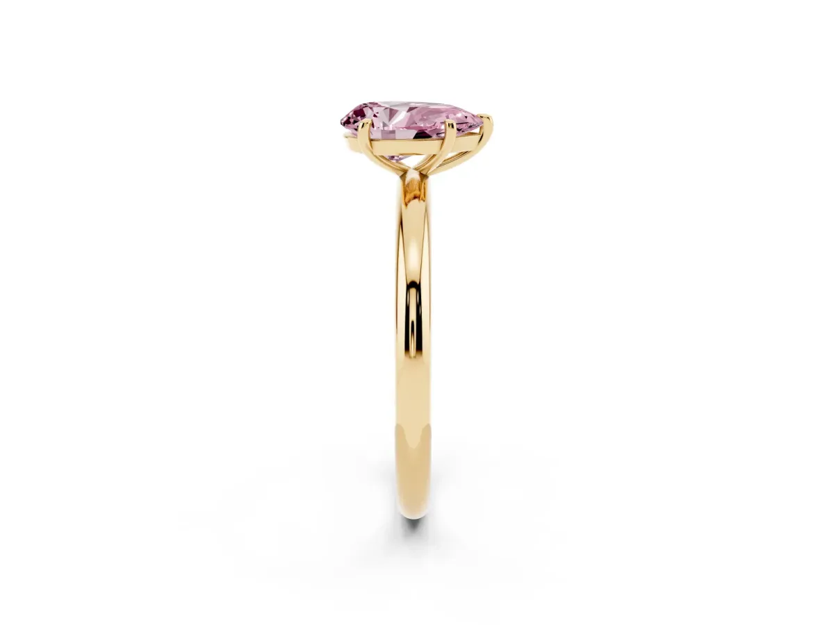 Fancy Pink Pear Cut Solitaire Diamond Ring with Four-Prong Setting on a Plain Band Yellow gold