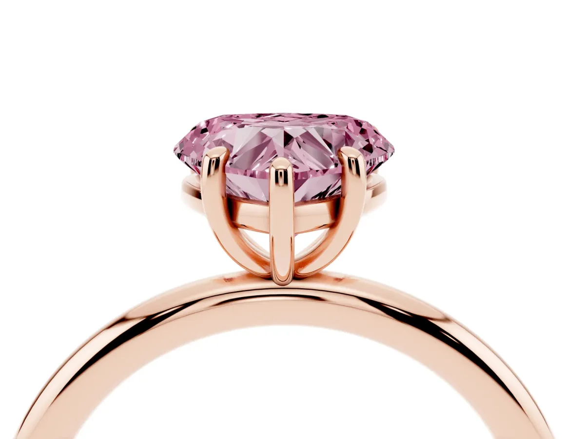 Fancy Pink Heart Cut Solitaire Diamond Ring with Four-Prong Setting on a Plain Band Rose gold