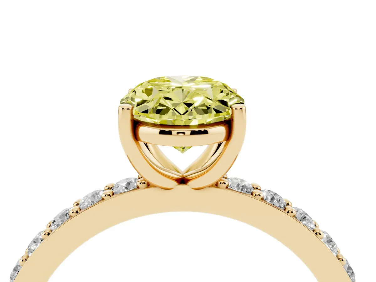 Fancy Yellow Oval Cut Cut Diamond Solitaire with Pave Band and Four-Prong Setting Yellow gold