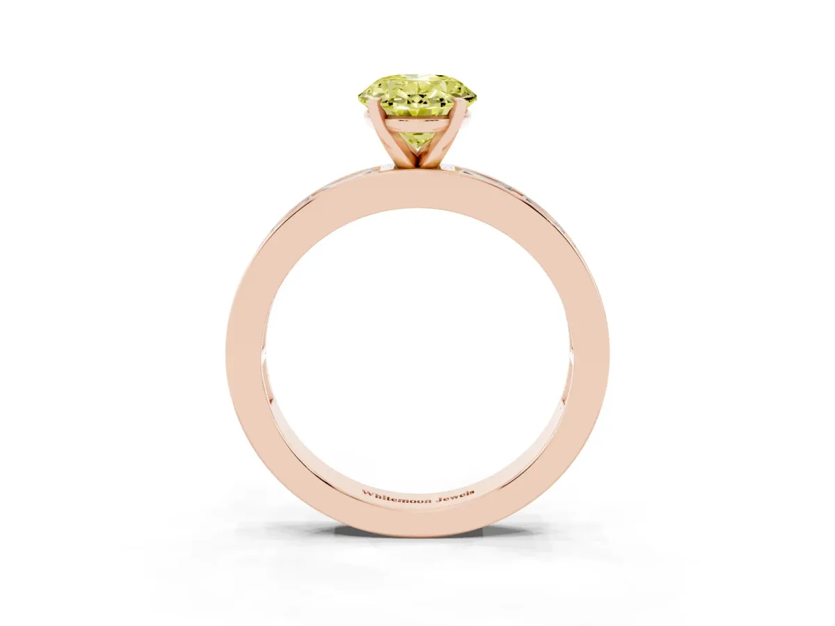 Fancy Yellow Oval Cut Solitaire Diamond Ring with Channel-Set Baguette Band and Four-Prong Setting Rose gold