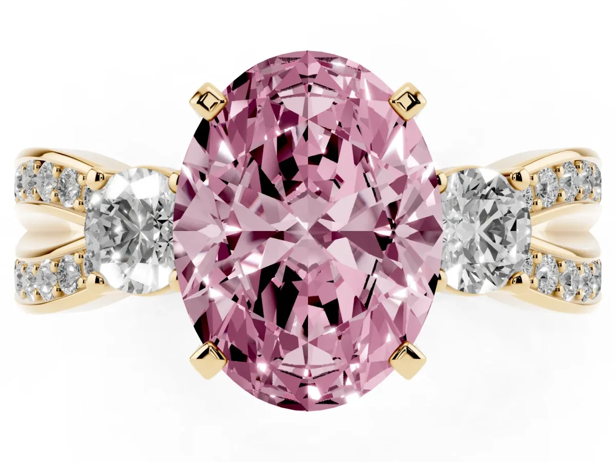 Fancy Pink Three-Stone Oval Cut Cut Diamond Twist Band with Prong Setting Yellow gold