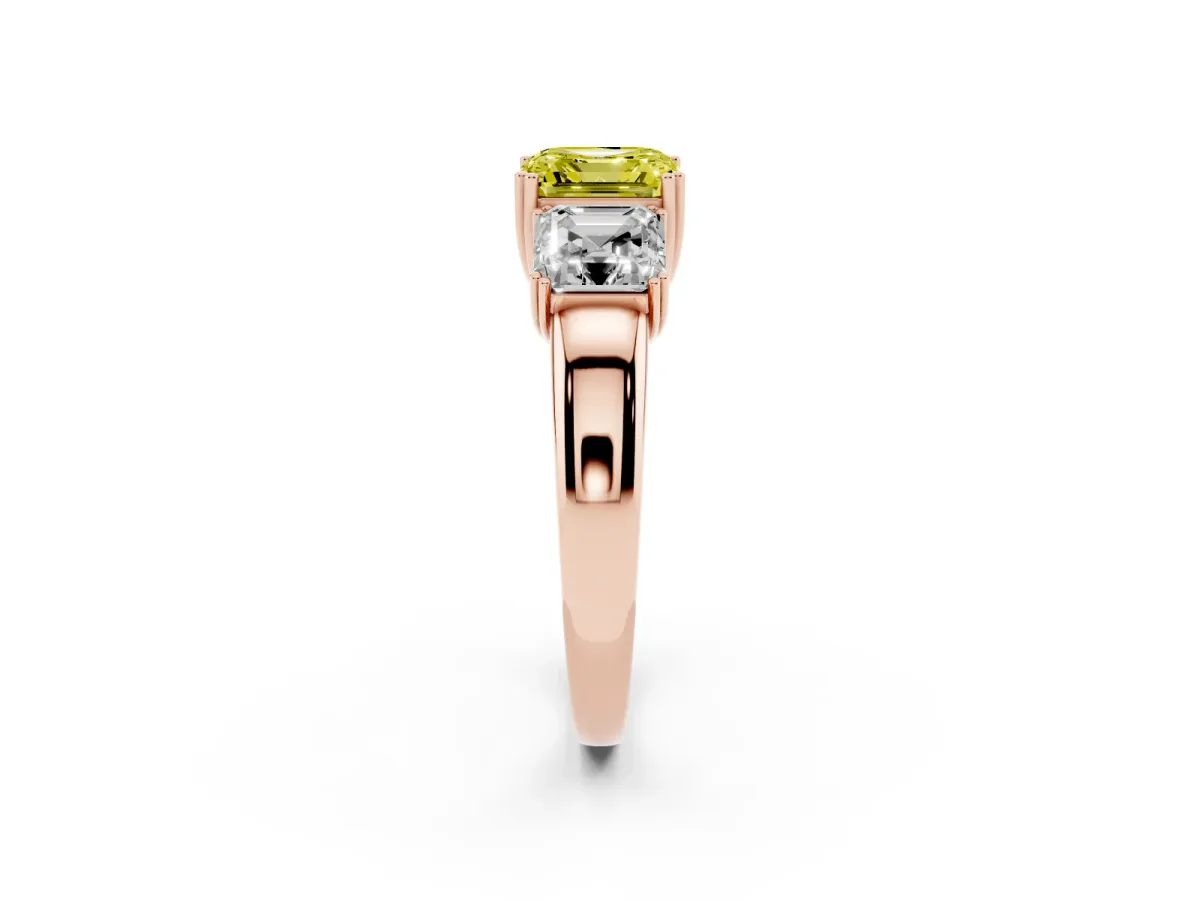 Fancy Yellow Three-Stone Asscher Cut Cut Diamond Ring with Channel Set Band and Four-Prong Setting Rose gold