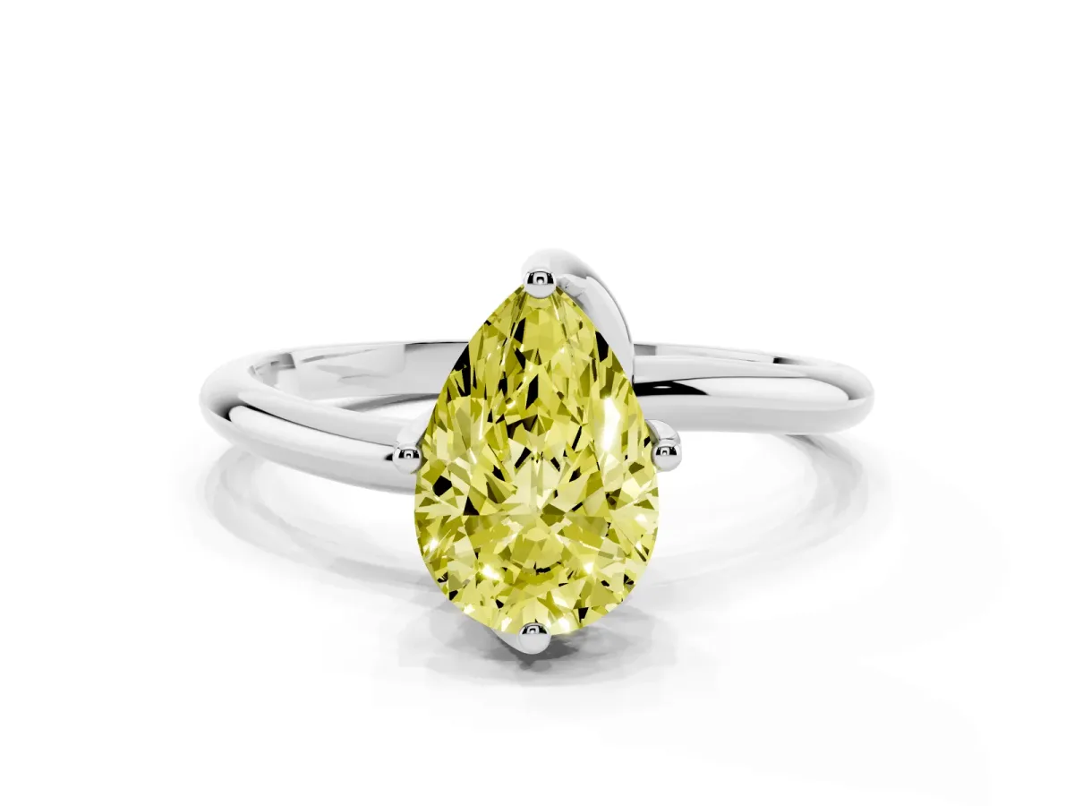 Fancy Yellow Pear Cut Diamond Solitaire Engagement Ring with Four-Prong Setting and Classic Band Silver