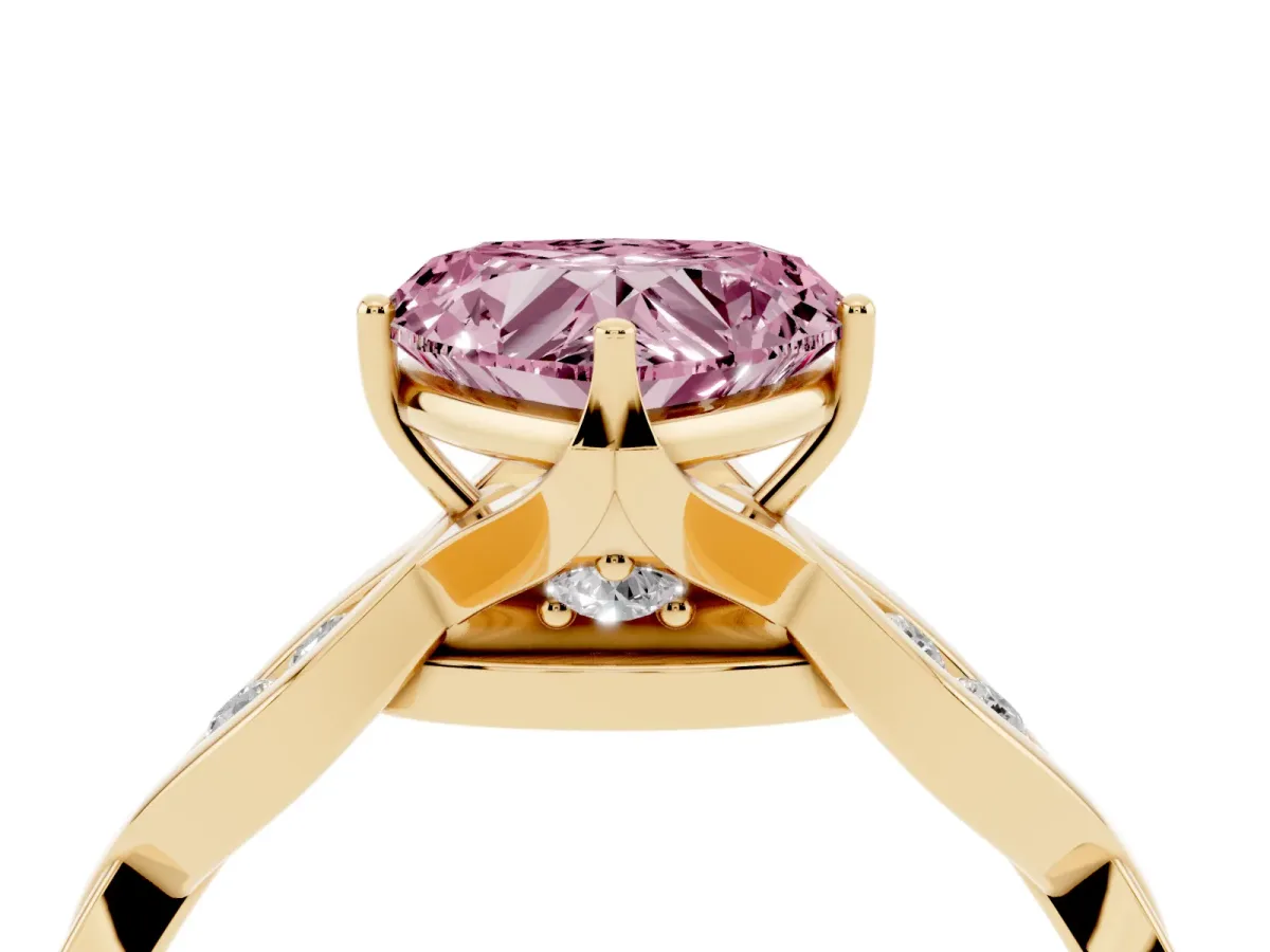 Fancy Pink Heart Cut Solitaire Twist Band with Leaf Prong Setting Yellow gold