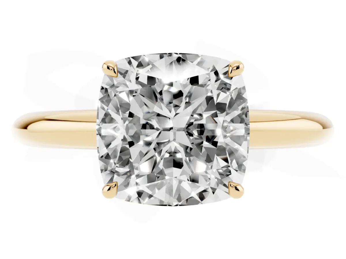 Cushion Cut Brilliant Solitaire Engagement Ring with Six-Prong Setting and Classic Band Yellow gold