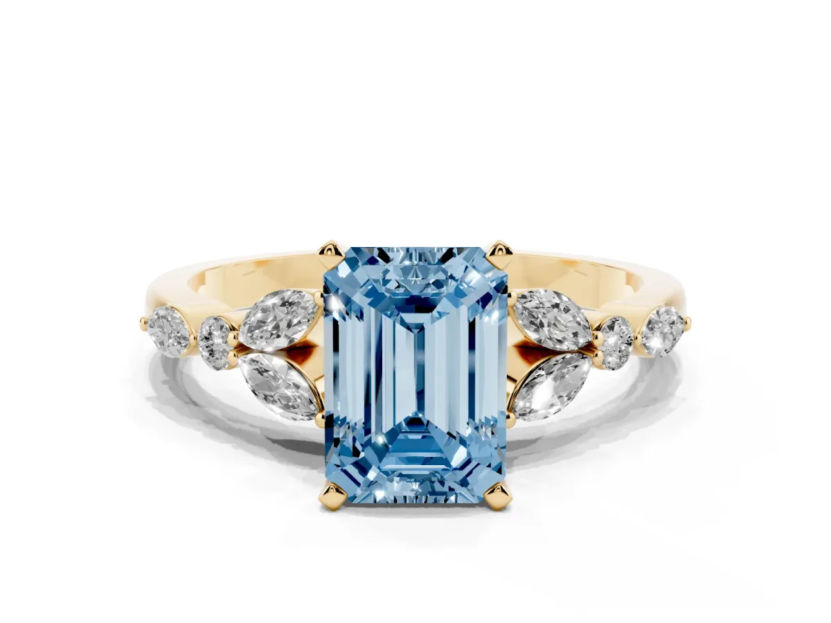 Fancy Blue Emerald Cut Diamond Solitaire Ring with Side Stones and Four-Prong Setting Yellow gold