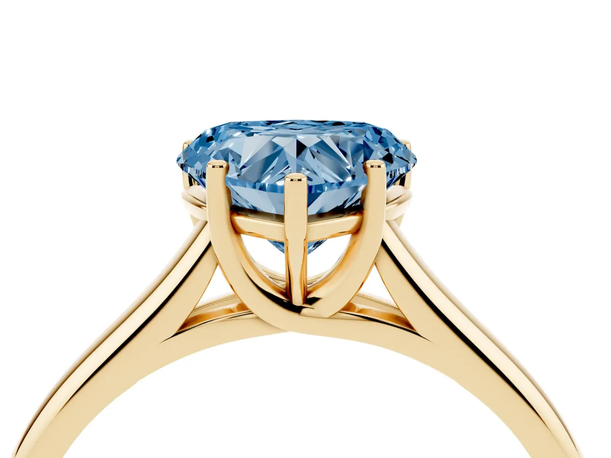 Fancy Blue Heart Cut Cut Diamond Solitaire Engagement Ring with Tapered Plain Band and Four-Prong Setting Yellow gold