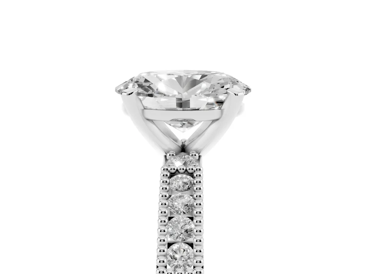 Oval Cut Solitaire with Pavé Band and Four-Prong Setting Platinum