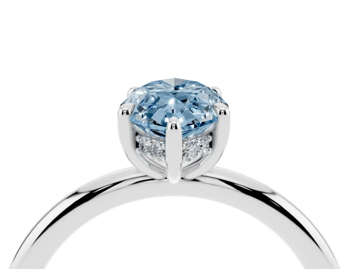 Fancy Blue Marquise Cut Diamond Solitaire Ring with Thin Band and Four-Prong Setting Silver