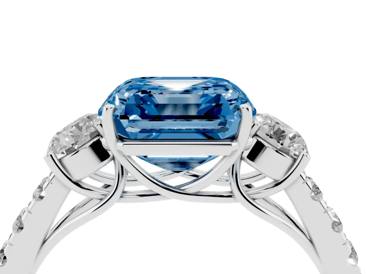 Fancy Blue Asscher Cut Cut Diamond Three-Stone Ring with Round Side Stones and Pavé Band White gold