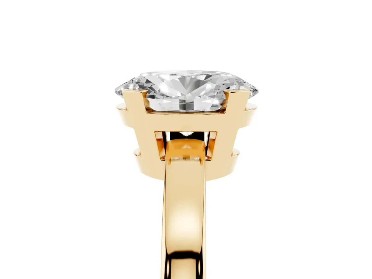 Oval Cut Cut Solitaire Ring with Four-Prong Setting and Classic Band Yellow gold