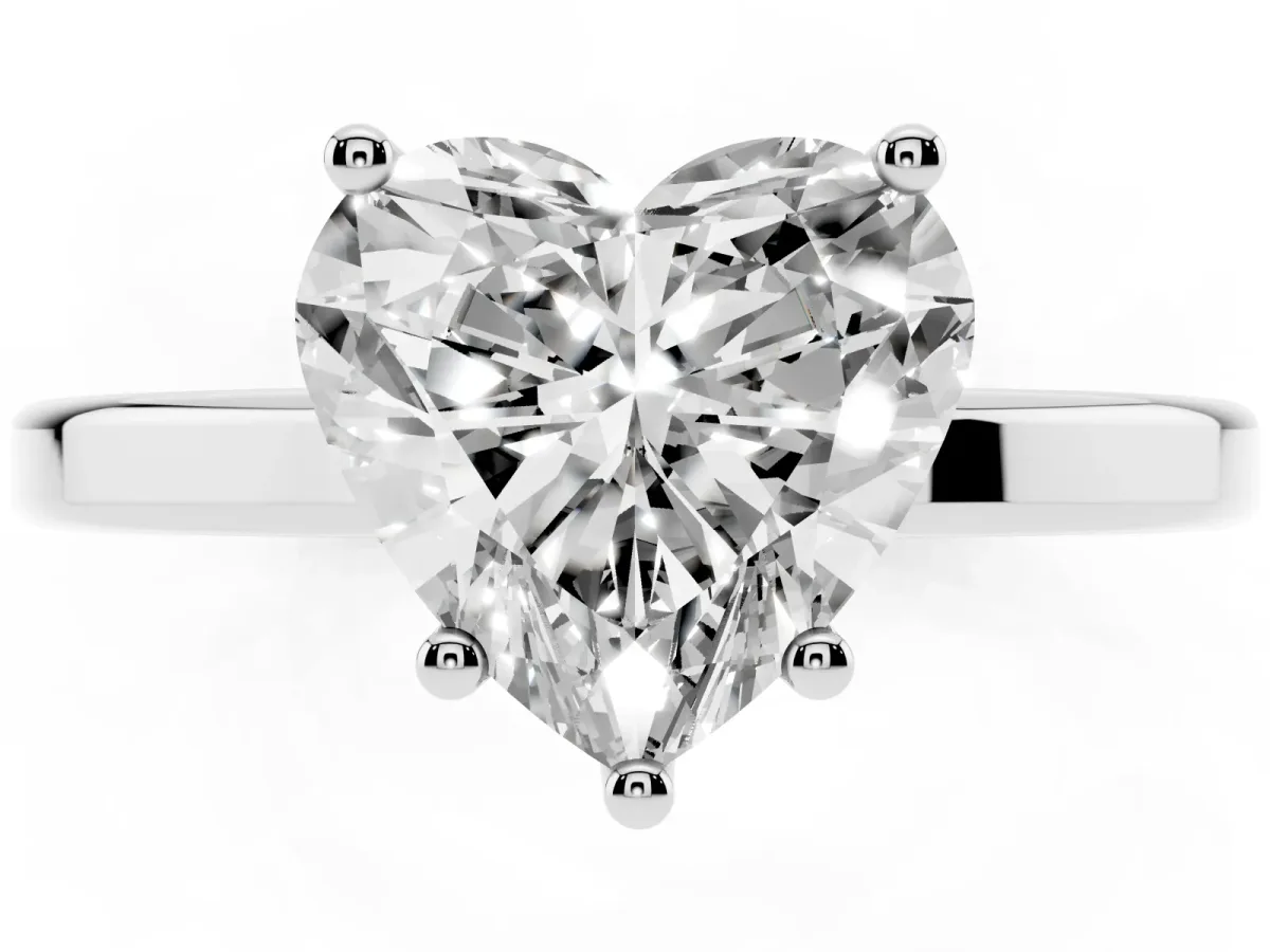 Heart Cut Cut Solitaire Engagement Ring with Four-Prong Setting on a Classic Band Silver