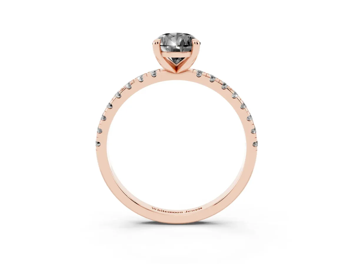 Fancy Black Pear Cut Diamond Brilliant Solitaire Ring with Pavé Band and Four-Prong Setting Rose gold