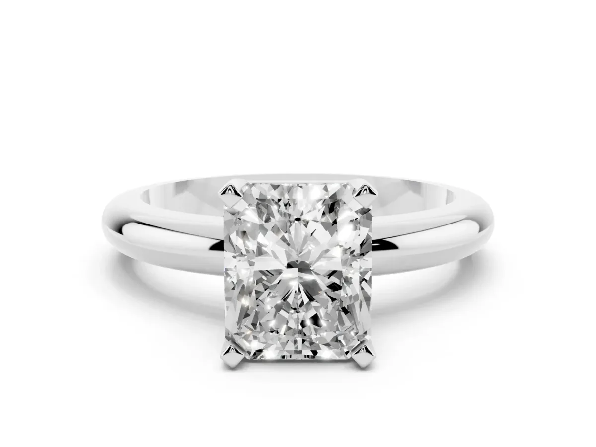 Radiant Cut Diamond Solitaire Engagement Ring with Round Band and Four-Prong Setting Silver