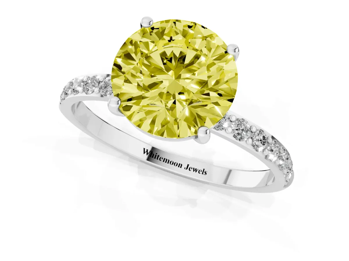 Fancy Yellow Round Cut Diamond Solitaire Ring with Round Pavé Shoulders and Prong Setting Silver