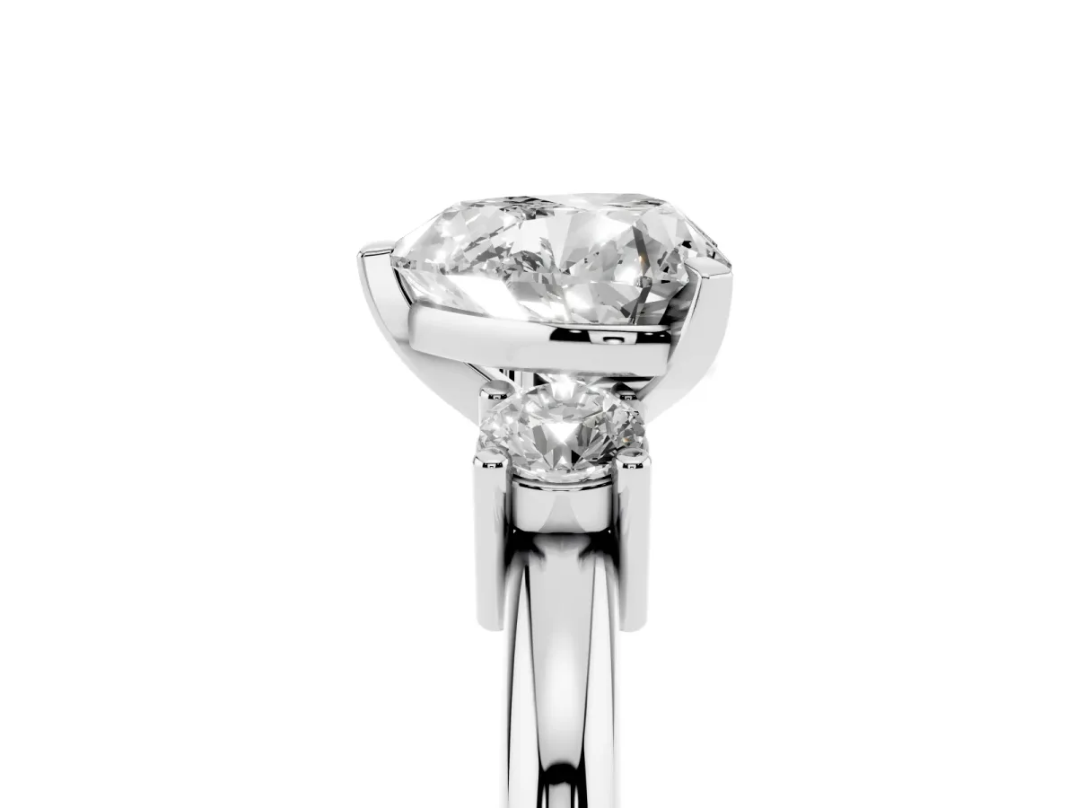 Three-Stone Heart Cut Cut Diamond Solitaire with Prong Setting and Classic Band Silver