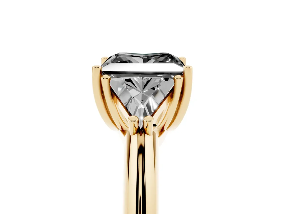 Fancy Black Three-Stone Princess Cut Diamond Engagement Ring with Trillion Side Stones and Prong Setting Yellow gold