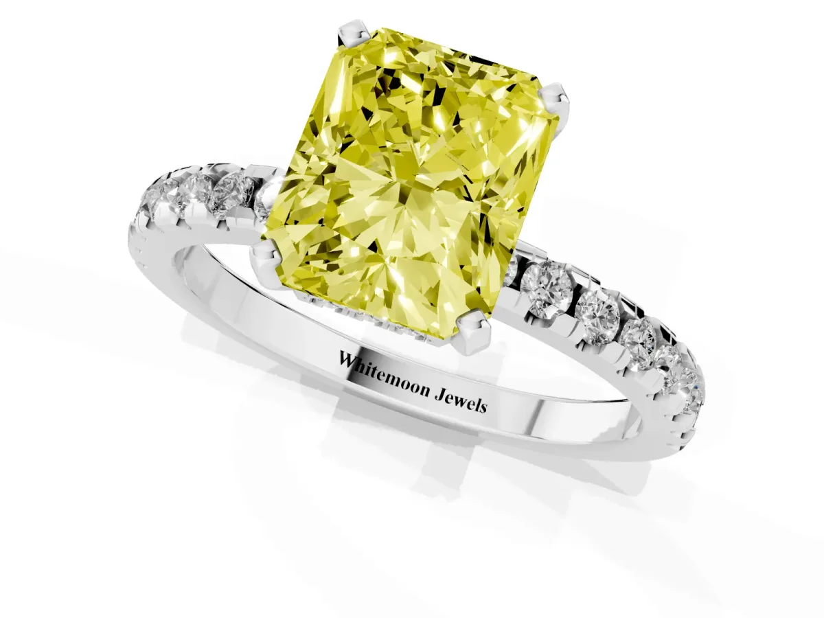 Fancy Yellow Radiant Cut Diamond Solitaire Ring with Round Pavé Band and Four-Prong Setting Silver