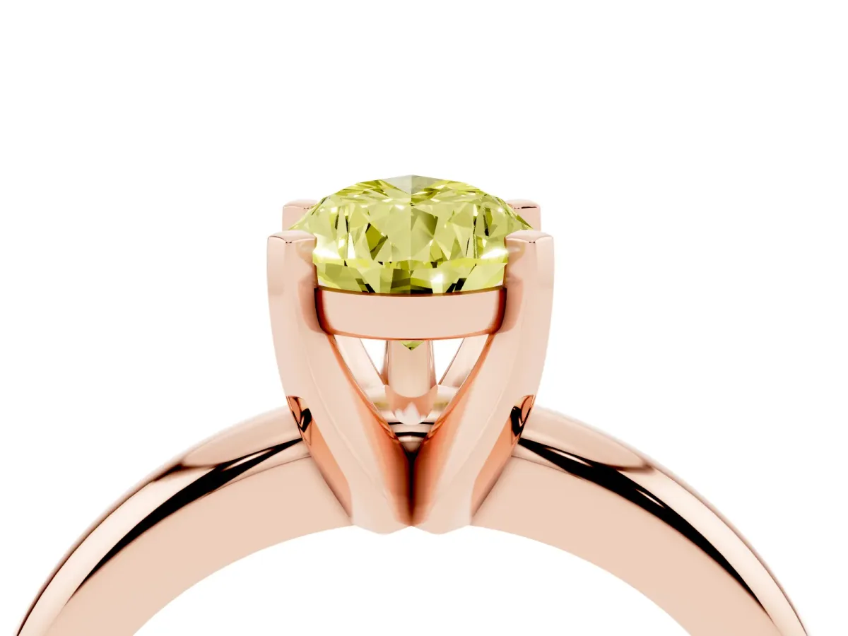 Fancy Yellow Pear Cut Diamond Solitaire Engagement Ring with Round Band and Four-Prong Setting Rose gold