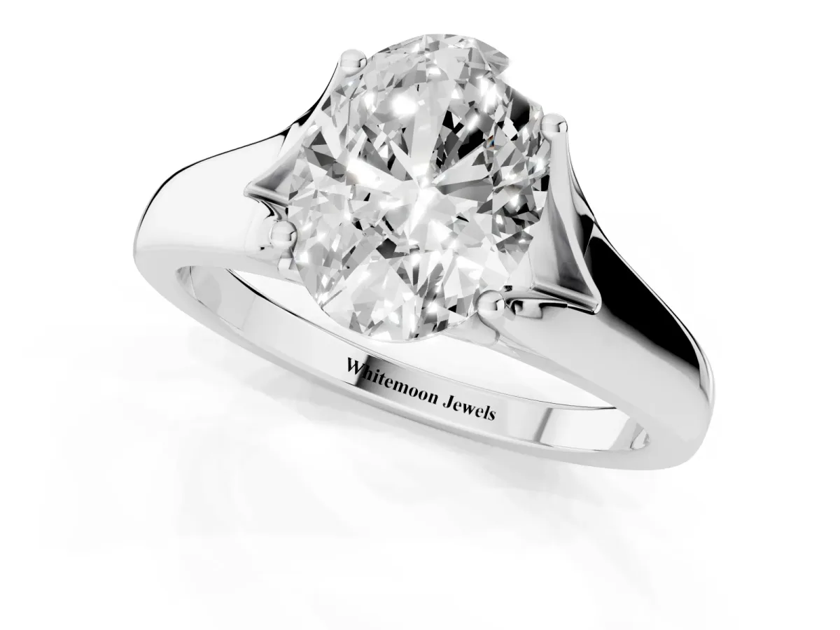 Oval Cut Solitaire Diamond Ring with Cathedral Band and Four-Prong Setting Silver