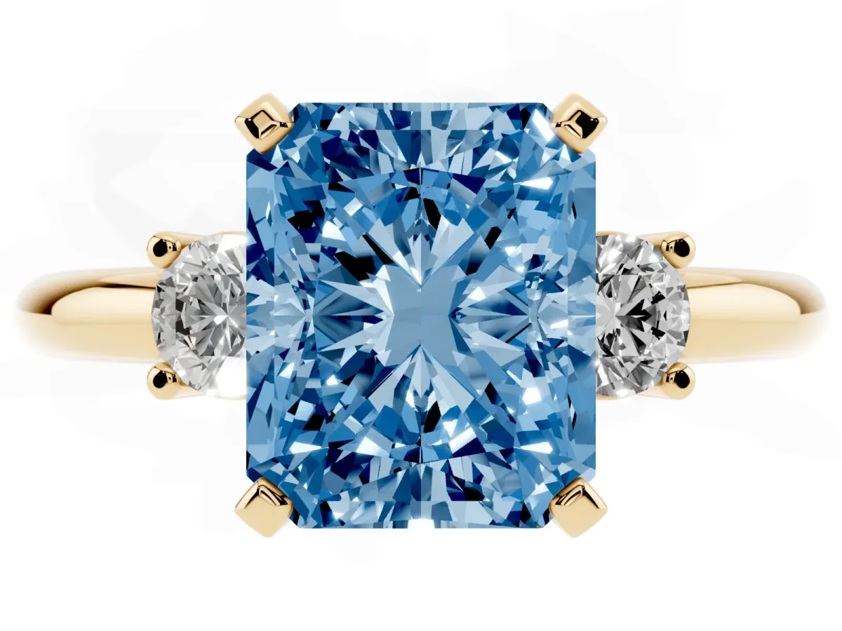 Fancy Blue Three-Stone Radiant Cut Cut Diamond Solitaire with Prong Setting and Classic Band Yellow gold