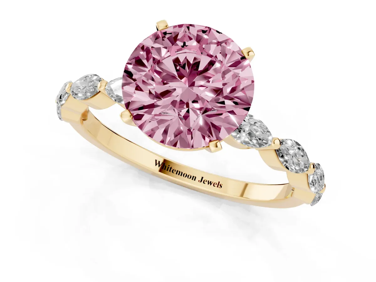 Fancy Pink Round Cut Diamond Ring with Marquise Side Stones and Prong Setting Yellow gold