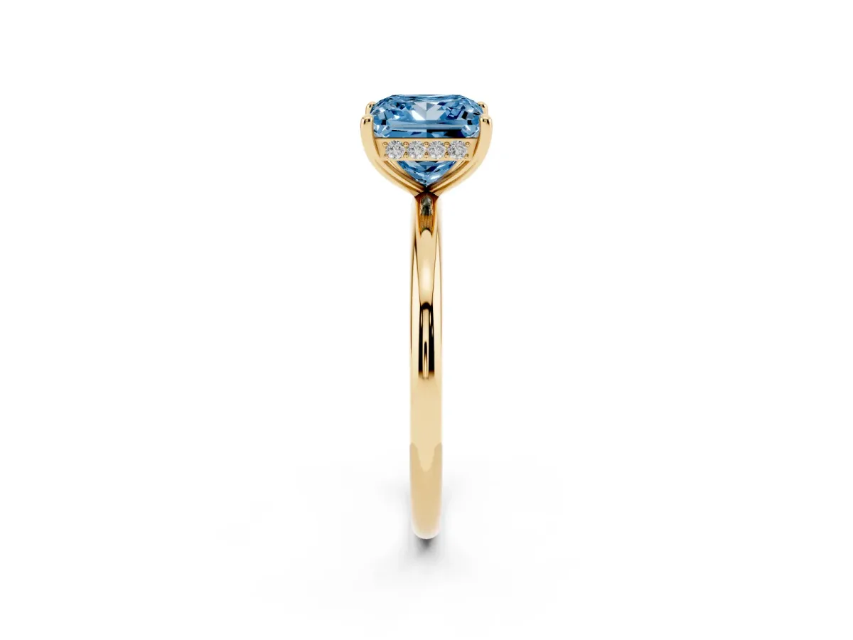 Fancy Blue Princess Cut Solitaire Diamond Ring with a Classic Band and Four-Prong Setting Yellow gold