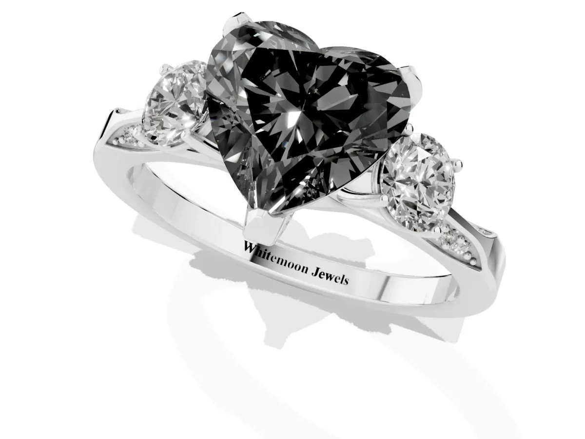 Fancy Black Heart Cut Brilliant Three-Stone Diamond Ring with Pavé Band and Four-Prong Setting Platinum