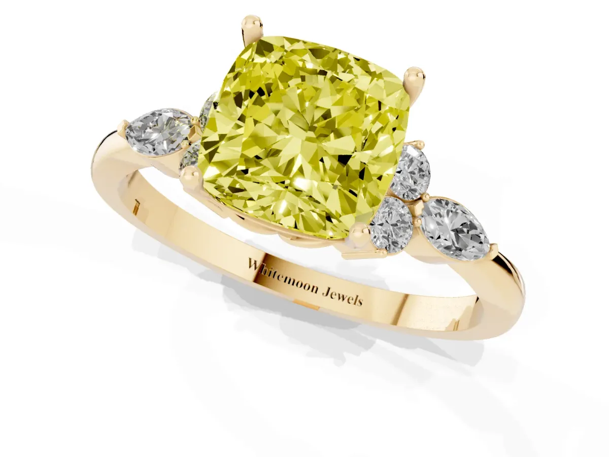 Fancy Yellow Cushion Cut Brilliant Diamond Solitaire Ring with Pear Side Stones and Four-Prong Setting Yellow gold