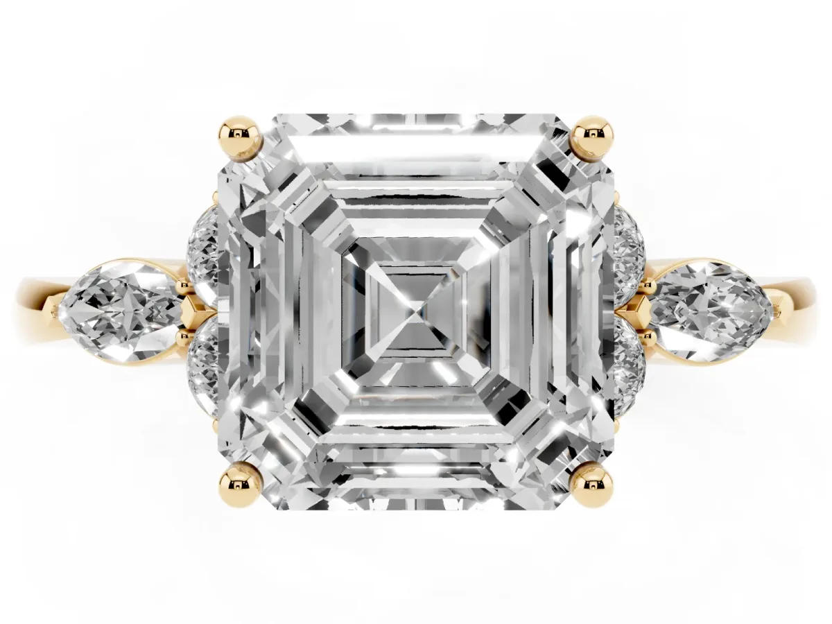 Asscher Cut Brilliant Diamond Solitaire Ring with Pear Side Stones and Four-Prong Setting Yellow gold