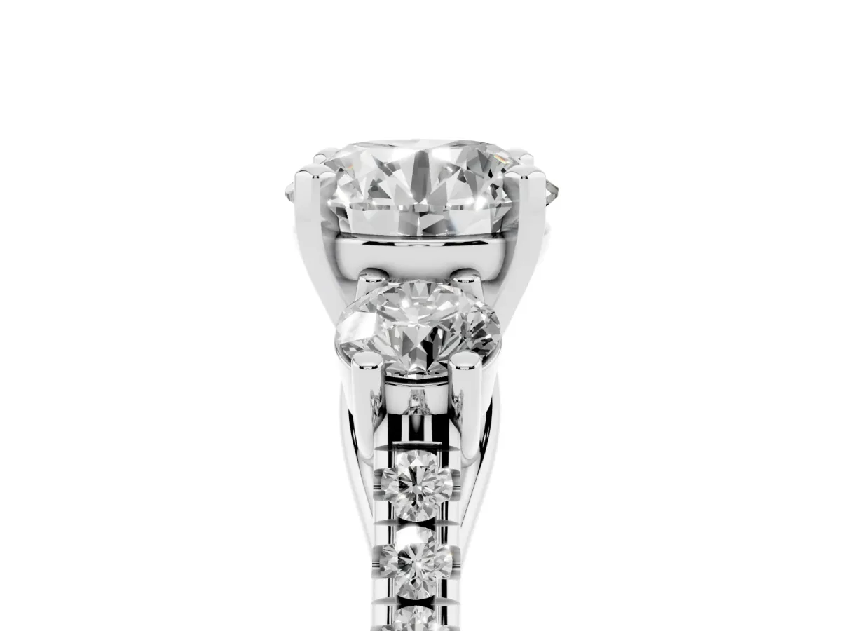 Three-Stone Round Cut Diamond Pavé Band with Four-Prong Setting Platinum