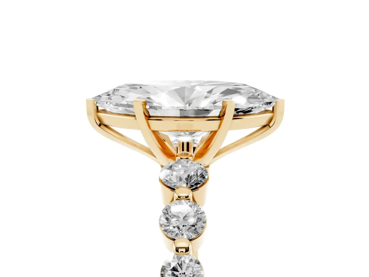 Marquise Cut Solitaire Diamond Ring with Pave Band and Four-Prong Setting Yellow gold