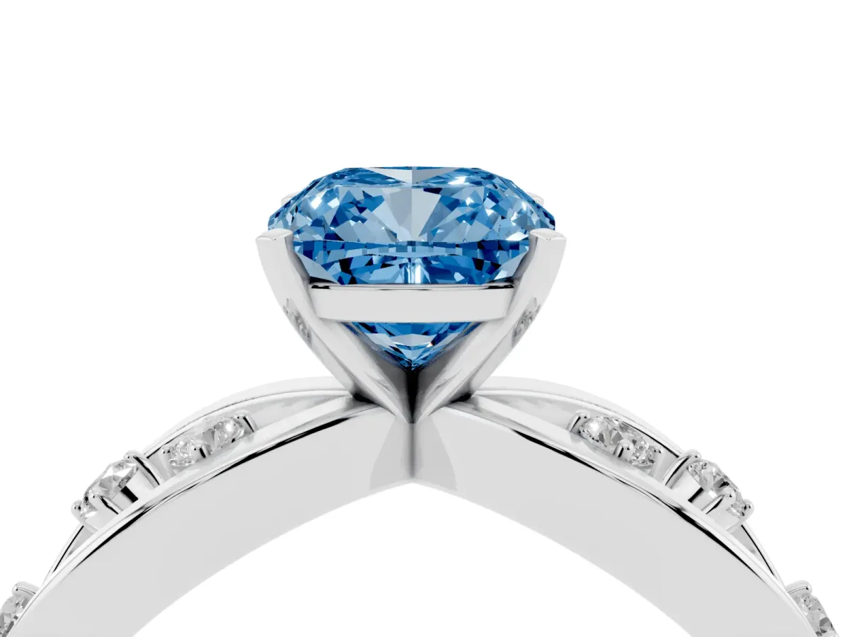 Fancy Blue Cushion Cut Cut Solitaire Diamond with Side Stones on Criss-Cross Band and Four-Prong Setting Silver