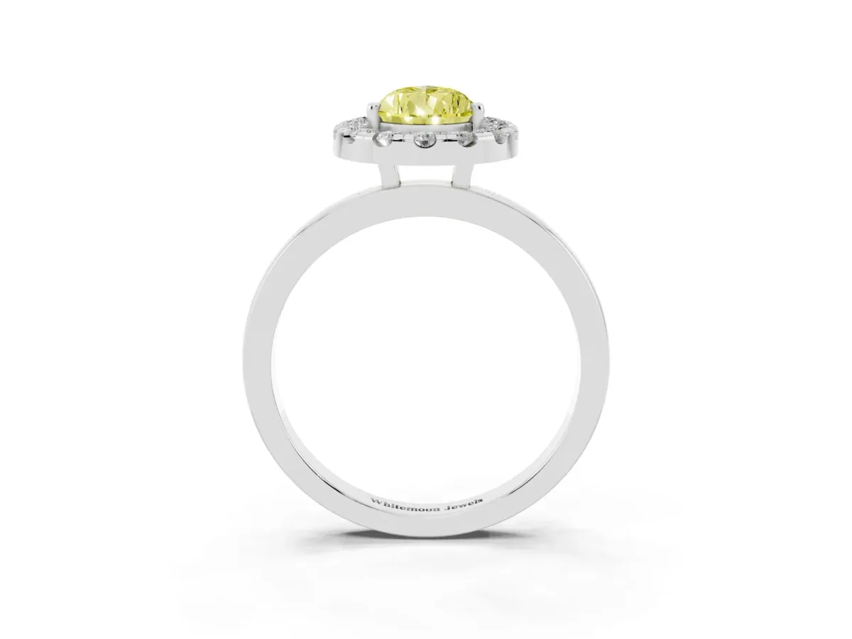 Fancy Yellow Pear Cut Halo Diamond Solitaire with Pavé Band and Four-Prong Setting Silver
