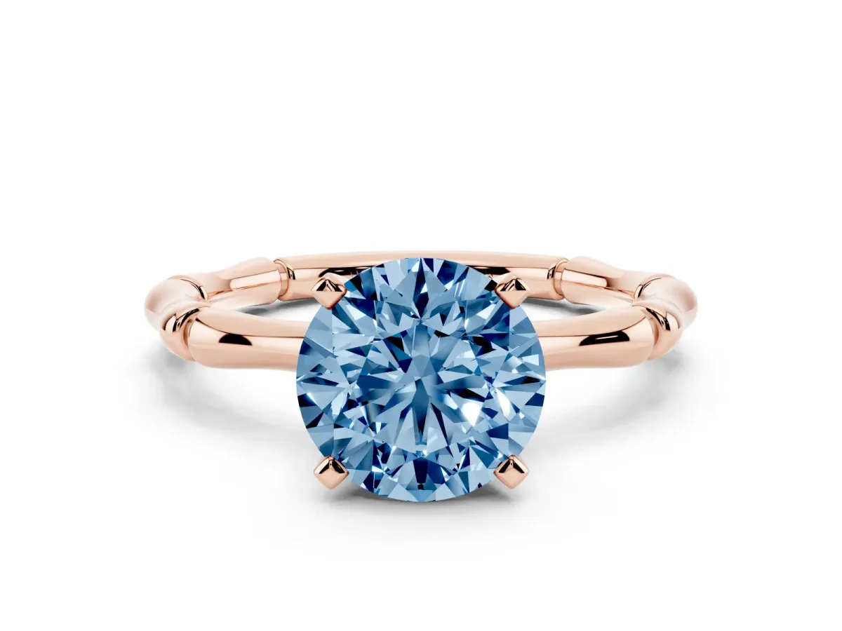 Fancy Blue Round Cut Solitaire Diamond Ring with Bamboo Band and Four-Prong Setting Rose gold