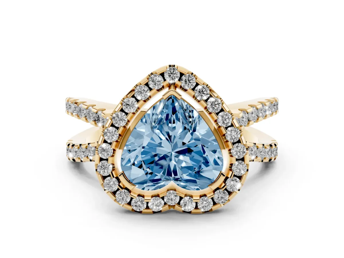 Fancy Blue Heart Cut Diamond Halo Ring with Split Shank Pavé Band and Prong Setting Yellow gold