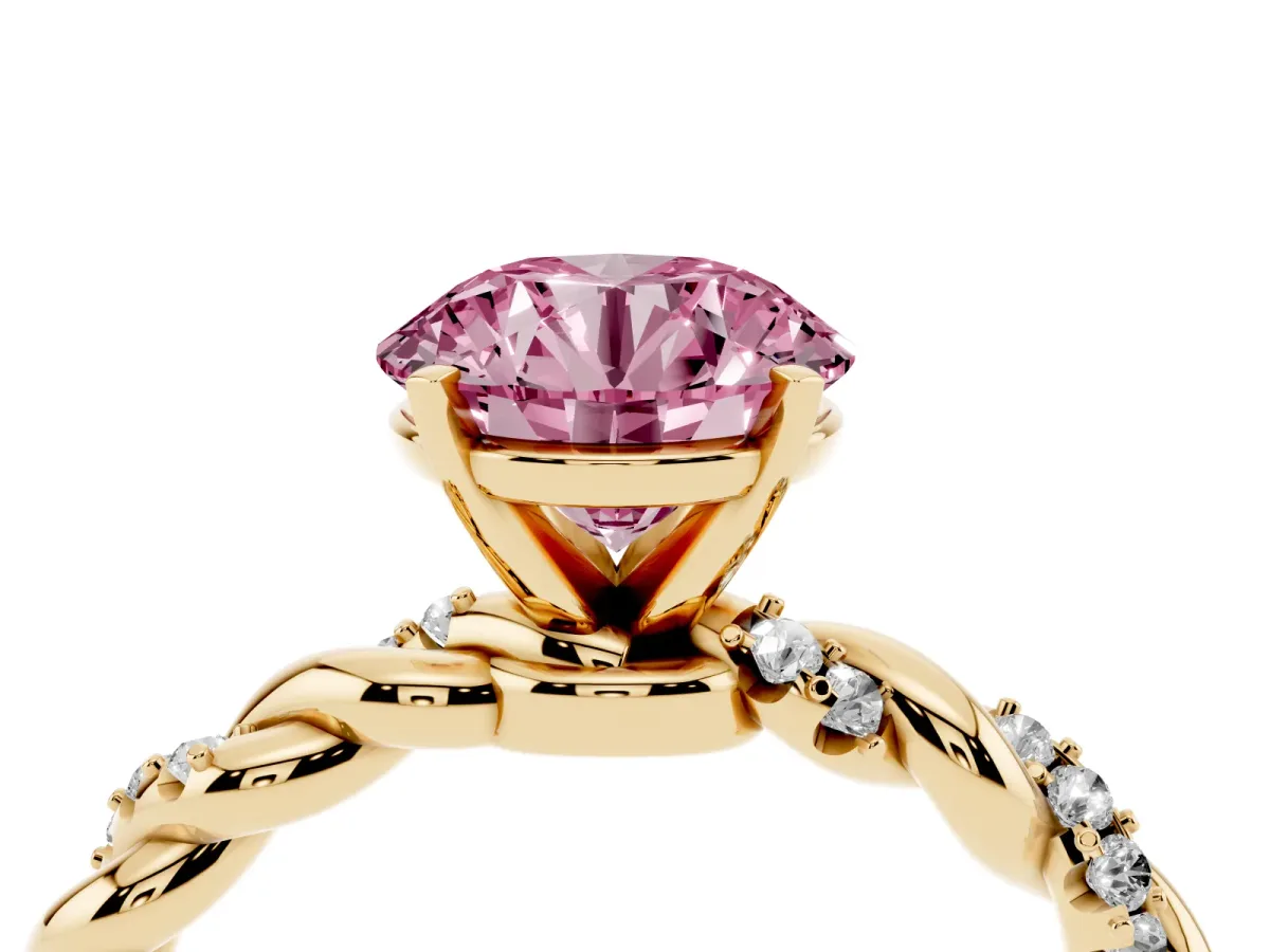 Fancy Pink Round Cut Diamond Solitaire Ring with Twisted Band and Pavé Accents Yellow gold