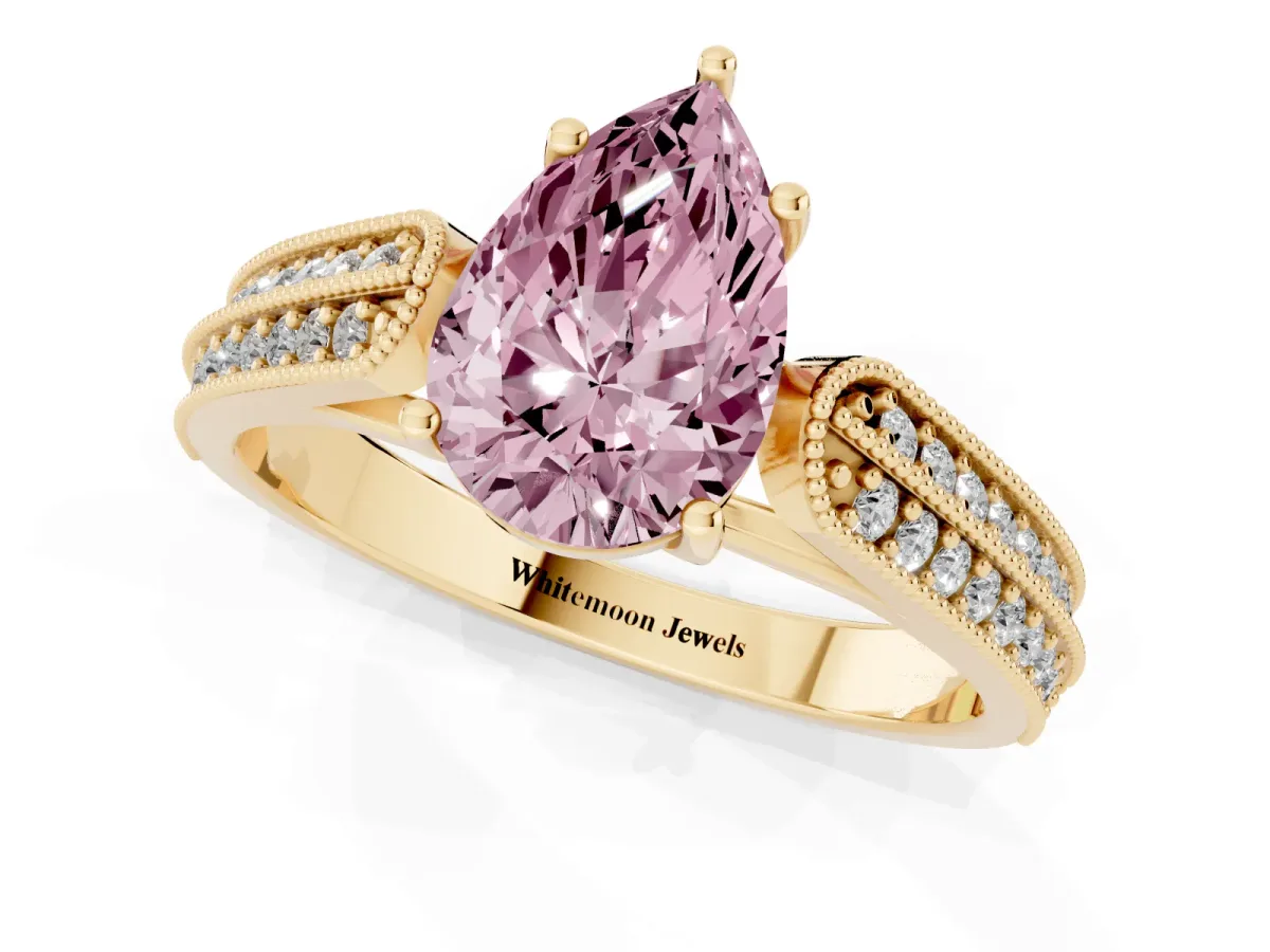Fancy Pink Pear Cut Cut Pave Split Shank Engagement Ring with Four-Prong Setting Yellow gold