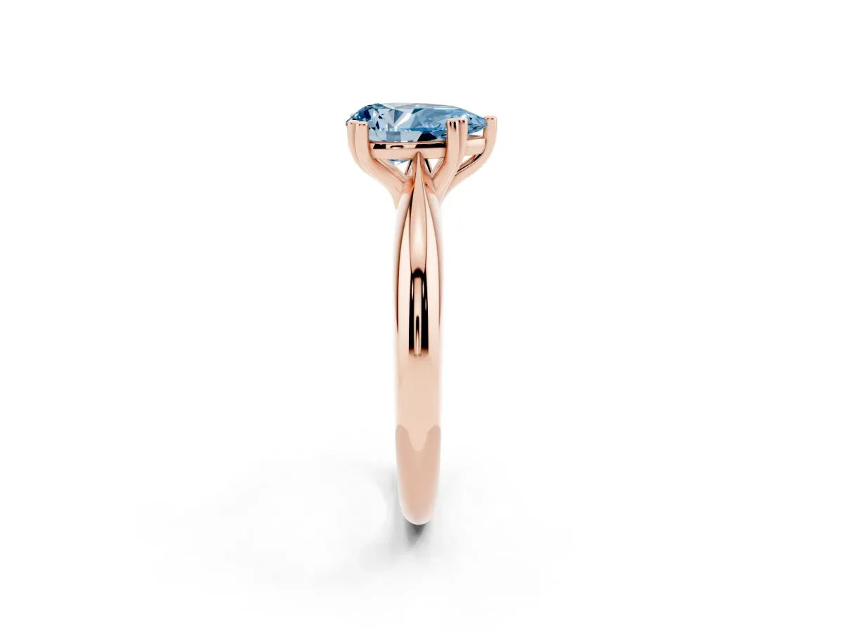 Fancy Blue Pear Cut Cut Solitaire Engagement Ring with Tapered Band and Four-Prong Setting Rose gold