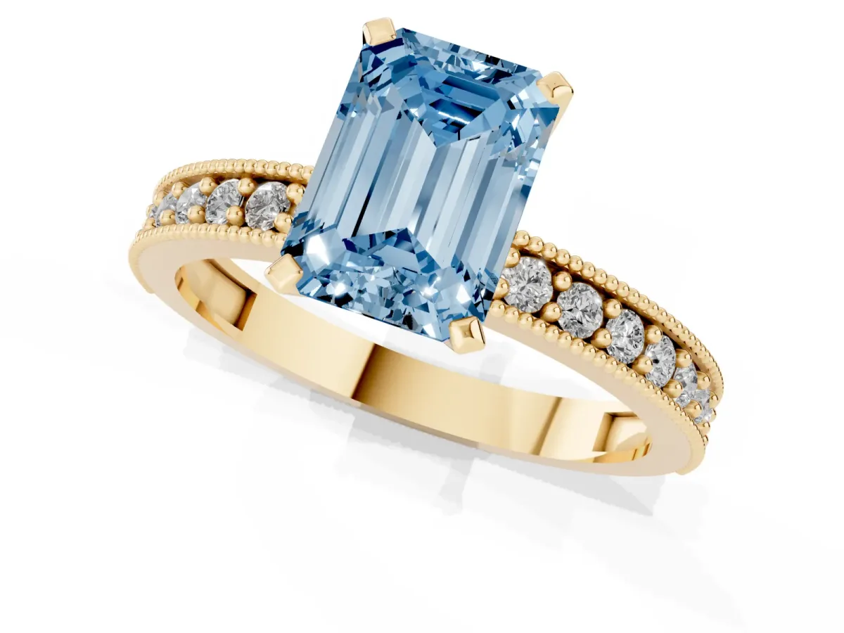 Fancy Blue Emerald Cut Diamond Milgrain Pavé Engagement Ring with Four-Prong Setting Yellow gold