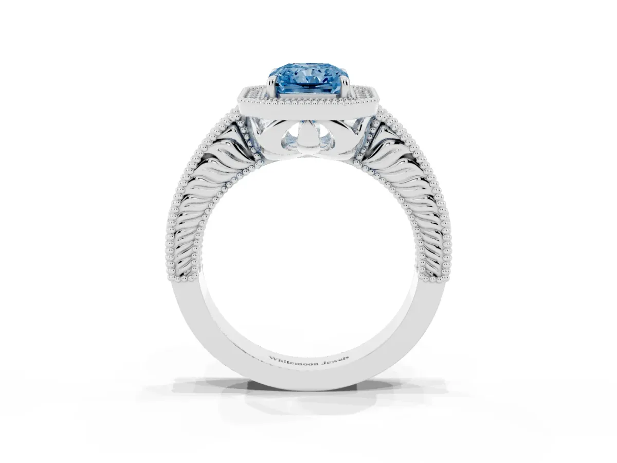 Fancy Blue Radiant Cut Cut Halo Diamond Ring with Pavé Band and Four-Prong Setting Platinum