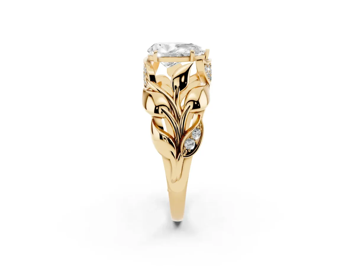 Pear Cut Diamond Leaf-Inspired Engagement Ring with Round Accents and Prong Setting Yellow gold